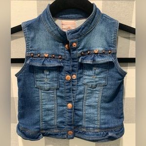 Marc by Janie, cotton jean vest with cute ruffles pocket detail.